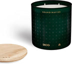 Skandinavisk Skog 'Forest' Scented Candle with 2 Wicks. Fragrance Notes: Pine Needles and Fir Cones, Birch Sap and Lily of The Valley. 14.1 oz.