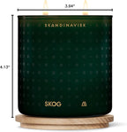 Skandinavisk Skog 'Forest' Scented Candle with 2 Wicks. Fragrance Notes: Pine Needles and Fir Cones, Birch Sap and Lily of The Valley. 14.1 oz.