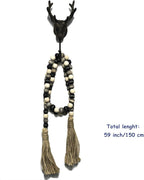CVHOMEDECO. Wood Beads Garland with Tassels Farmhouse Rustic Wooden Prayer Bead String Wall Hanging Accent for Home Festival Decor. Black Grey Mix Distressed