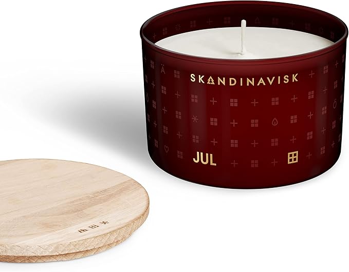 Skandinavisk JUL 'Christmas' Scented Candle. Fragrance Notes: Baked Gingerbread, Winter Cloves and Spiced Oranges. 3.17 oz.