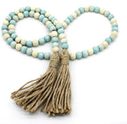 CVHOMEDECO. Wood Beads Garland with Tassels Farmhouse Rustic Wooden Prayer Bead String Wall Hanging Accent for Home Festival Decor. Teal Mix Distressed