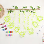 Wall Hanging Photo Display with Artificial Leaves Vines, Macrame Photo Holders, Boho Pictures Organizer for Wall Decoration, with 15 Wood Clips, for Home, Office, Classroom, Party, Wedding