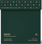 Skandinavisk Skog 'Forest' Scented Candle with 2 Wicks. Fragrance Notes: Pine Needles and Fir Cones, Birch Sap and Lily of The Valley. 14.1 oz.