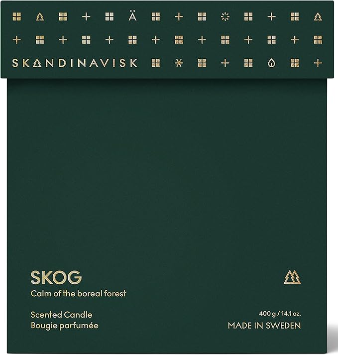 Skandinavisk Skog 'Forest' Scented Candle with 2 Wicks. Fragrance Notes: Pine Needles and Fir Cones, Birch Sap and Lily of The Valley. 14.1 oz.