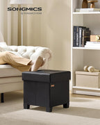 SONGMICS Storage Ottoman, Cube Ottoman with Legs, 15 x 15 x 15.7 Inches, Footstool, Footrest, 10 Gal. (37 L), Synthetic Leather, for Bedroom, Living Room, Dorm, Ink Black ULSF0512B02