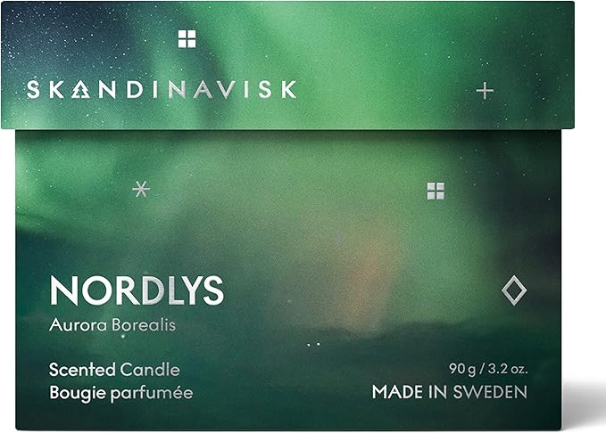 Skandinavisk NORDLYS 'Northern Lights' Scented Candle. Fragrance Notes: Arctic Intensity and Celestial Colour, a Singular Symphony for Senses. 3.17 oz.