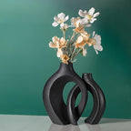 Levvohd Black Hollow Ceramic Vase Set of 2, Snuggle Round Boho Donut Modern Vase Nordic Minimalist Decorative Vase for Modern Trendy Home Table Centerpiece Decor (W 6.3" X H 8")
