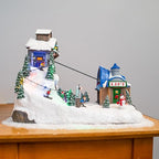 Animated Christmas Village Powder Ridge Resort | Christmas House Collection Accessories Figurines for Christmas Decorations and Gift | Motion & Sound Multicolor LED Lights 14" x 9" x 11"