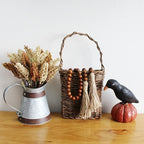 CVHOMEDECO. Wood Grain Beads Garland with Tassels Farmhouse Rustic Wooden Prayer Bead String Wall Hanging Accent for Home Festival Decor. Dark Tan