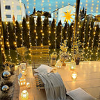 JMEXSUSS 900 LED Outdoor Christmas Curtain Lights, 9.5x29.5ft Christmas Lights Plug in with Remote, Twinkle Hanging String Light for Bedroom Wall Wedding Backdrop Window Gazebo Decor, Warm White