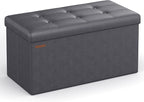 SONGMICS Mazie Collection - 30 Inches Folding Storage Ottoman Bench, Ottoman with Storage, Foot Rest Stool, Load 660 lb, for Living Room, Synthetic Leather, Dark Gray ULSF040G01