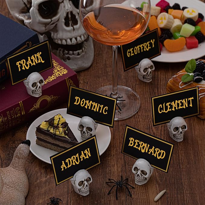 24 Set Halloween Skull Place Card Holders with 48 Pcs Place Cards Resin Small Skull Head Table Number Holders Clips Photo Stand Centerpieces for Halloween Party Wedding Birthday Decorations