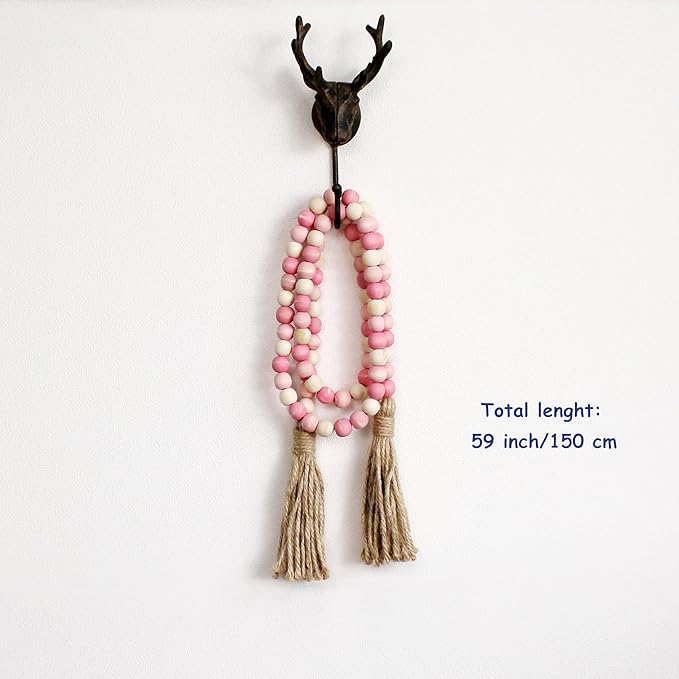 CVHOMEDECO. Wood Beads Garland with Tassels Farmhouse Rustic Wooden Prayer Bead String Wall Hanging Accent for Home Festival Decor. Pink Mix Distressed