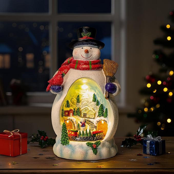 Snowman Figurine Lighted Christmas Village with Animated Rotating Train - Battery or USB Powered Snowman Decor Ornaments, LED Lights & Festive Music for Tabletop Home Holiday Collection Decorations