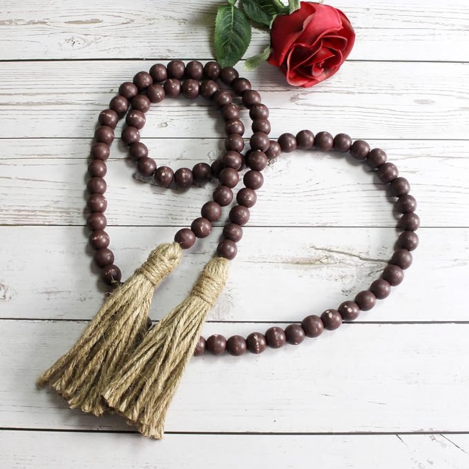 CVHOMEDECO. Wood Beads Garland with Tassels Farmhouse Rustic Wooden Prayer Bead String Wall Hanging Accent for Home Festival Decor. Brown Distressed