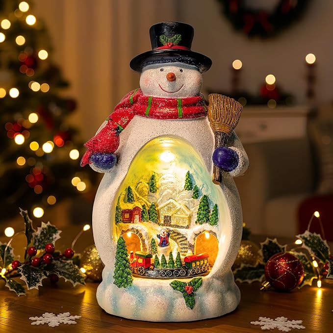 Snowman Figurine Lighted Christmas Village with Animated Rotating Train - Battery or USB Powered Snowman Decor Ornaments, LED Lights & Festive Music for Tabletop Home Holiday Collection Decorations