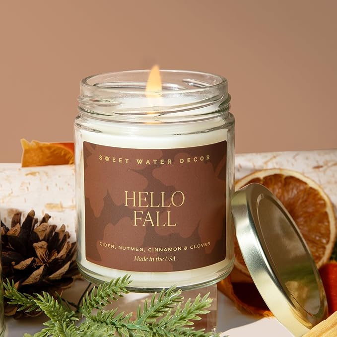 Sweet Water Decor Hello Fall Candle - Cinnamon Apples Cloves & Nutmeg Fall Scented Candle for Home Decor - 100% Cotton Wick Halloween Candle with 40 Hour Burn Time - Made in The USA - 9oz Clear Jar