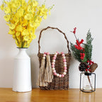 CVHOMEDECO. Wood Beads Garland with Tassels Farmhouse Rustic Wooden Prayer Bead String Wall Hanging Accent for Home Festival Decor. Pink Mix Distressed