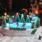VCUTEKA Christmas Village Houses, Santa Claus with Tree and Rotating Kids Skating Lighted Musical Christmas Village Collectible Building for Xmas Indoor Decorations or Holiday Table Displays