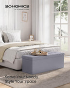 SONGMICS MAZIE Collection - 43 Inches Folding Storage Ottoman Bench, Ottoman with Storage, Foot Rest Stool, Load 660 lb, for Living Room, Synthetic Leather, Light Gray ULSF70GY