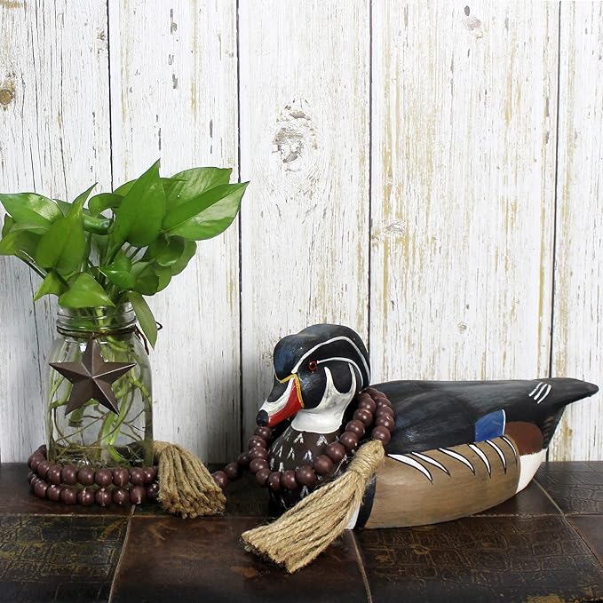 CVHOMEDECO. Wood Beads Garland with Tassels Farmhouse Rustic Wooden Prayer Bead String Wall Hanging Accent for Home Festival Decor. Brown Distressed