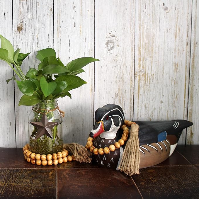 CVHOMEDECO. Wood Grain Beads Garland with Tassels Farmhouse Rustic Wooden Prayer Bead String Wall Hanging Accent for Home Festival Decor. Light Tan