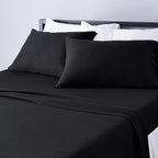 Amazon Basics 4 Piece Bed Sheet Set, 100% Cotton Jersey, Includes Super Soft, Flat and Fitted Sheets, Pillowcase, Queen, Black, Solid