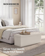 SONGMICS Mazie Collection - 43 Inches Folding Storage Ottoman Bench, Ottoman with Storage, Foot Rest Stool, Load 660 lb, for Living Room, Synthetic Leather, Cream White ULSF70M