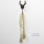 CVHOMEDECO. Wood Beads Garland with Tassels Farmhouse Rustic Wooden Prayer Bead String Wall Hanging Accent for Home Festival Decor. Natural