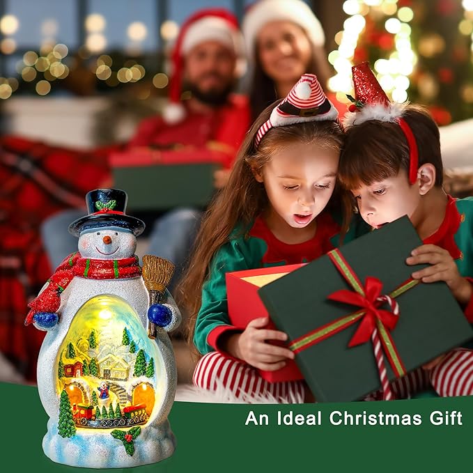 Snowman Figurine Lighted Christmas Village with Animated Rotating Train - Battery or USB Powered Snowman Decor Ornaments, LED Lights & Festive Music for Tabletop Home Holiday Collection Decorations