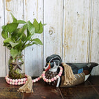 CVHOMEDECO. Wood Beads Garland with Tassels Farmhouse Rustic Wooden Prayer Bead String Wall Hanging Accent for Home Festival Decor. Pink Mix Distressed